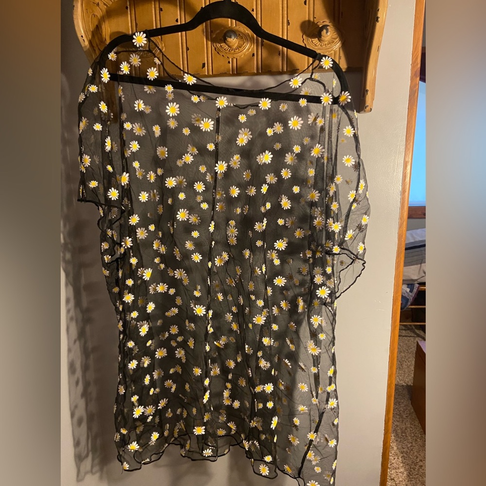 Sheer top with colorful daisies